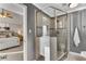 En-suite bathroom with tiled shower, glass doors, and direct access to main bedroom at 4519 Glenforest Ne Dr, Roswell, GA 30075