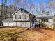 Charming home featuring a two-car garage, landscaped yard, and modern architectural design at 4519 Glenforest Ne Dr, Roswell, GA 30075