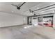 Bright two-car garage with direct access to the house, featuring clean concrete floors and ample lighting at 4519 Glenforest Ne Dr, Roswell, GA 30075