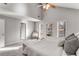 Bright main bedroom with vaulted ceiling, plush carpet, and modern shelving at 4519 Glenforest Ne Dr, Roswell, GA 30075
