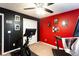 Spacious exercise room with Peloton bike, treadmill, ceiling fan and inspiring decor at 531 Lindsey Way, Social Circle, GA 30025