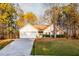 Charming single-Gathering home featuring a two-car garage, stone accents, and a well-manicured lawn at 531 Lindsey Way, Social Circle, GA 30025