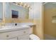 Classic bathroom with a vanity, sink, toilet, and walk-in shower at 2992 Westminster Nw Cir, Atlanta, GA 30327