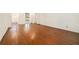 Bright, open-concept living room featuring hardwood floors, neutral wall paint, and natural light at 2992 Westminster Nw Cir, Atlanta, GA 30327