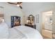 Bedroom with a bed, and a view into an on-suite bathroom at 3225 Suffolk Dr, Cumming, GA 30041
