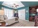 Comfortable bedroom with neutral colors and a large window at 3225 Suffolk Dr, Cumming, GA 30041