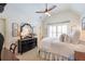 Bedroom featuring a bed with an oversized ceiling fan at 3225 Suffolk Dr, Cumming, GA 30041