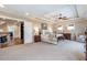 Large main bedroom with tray ceilings, neutral carpet, and a view into the hallway at 3225 Suffolk Dr, Cumming, GA 30041