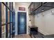Well-organized mud room with custom cabinets, a bench, and coat hooks at 3225 Suffolk Dr, Cumming, GA 30041