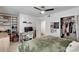 Bright bedroom featuring a desk, shelving, and a large closet for ample storage at 6940 Roswell Rd # 5B, Atlanta, GA 30328