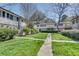Beautiful exteriors with a large lawn, perfect for outdoor activities and relaxation at 6940 Roswell Rd # 5B, Atlanta, GA 30328