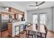 Modern kitchen with stainless steel appliances and dining area at 6940 Roswell Rd # 5B, Atlanta, GA 30328