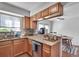 A kitchen featuring granite countertops, stainless steel appliances, and wooden cabinetry at 6940 Roswell Rd # 5B, Atlanta, GA 30328