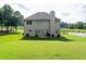 Spacious backyard featuring a well-maintained lawn and ample space for outdoor enjoyment at 1585 Elliott Rd, Mcdonough, GA 30252
