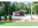Outdoor boat storage area featuring a covered shelter and ample space for multiple boats and equipment at 1585 Elliott Rd, Mcdonough, GA 30252