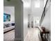 Inviting foyer with plank flooring, a staircase, and views into the adjacent living spaces at 1585 Elliott Rd, Mcdonough, GA 30252