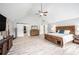 Spacious main bedroom boasting vaulted ceilings, wood floors, and a walk-in closet at 1585 Elliott Rd, Mcdonough, GA 30252