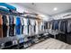 Spacious walk-in closet with ample storage and organization, ideal for clothes, shoes and suitcases at 1585 Elliott Rd, Mcdonough, GA 30252