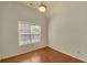 Cozy bedroom with neutral walls, hardwood floors and vaulted ceiling at 206 Glens Loop, Woodstock, GA 30188