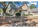 Charming single-Gathering home featuring a manicured lawn and traditional architecture at 206 Glens Loop, Woodstock, GA 30188