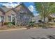 Beautiful home exterior with lush landscaping and a well-manicured lawn at 206 Glens Loop, Woodstock, GA 30188