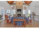Inviting living room features high ceilings, stone fireplace, and hardwood floors at 206 Glens Loop, Woodstock, GA 30188