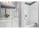 Bathroom featuring double sinks, vanity, and a combined shower and tub, perfect for Gathering convenience at 2462 Chestnut Lndg, Atlanta, GA 30360