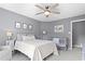 Inviting bedroom featuring soft neutral colors, cozy bedding, and natural light, with crib and matching furniture at 2462 Chestnut Lndg, Atlanta, GA 30360