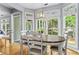 Cozy dining area with large windows offers a serene space for Gathering meals at 2462 Chestnut Lndg, Atlanta, GA 30360