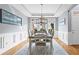 Elegant dining room with tray ceiling, chandelier, and large windows at 2462 Chestnut Lndg, Atlanta, GA 30360