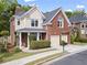 Charming brick home with two-car garage and well-manicured landscaping at 2462 Chestnut Lndg, Atlanta, GA 30360