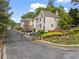 Upscale homes with a gate for privacy in a landscaped neighborhood at 2462 Chestnut Lndg, Atlanta, GA 30360