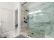 Sleek bathroom with a glass-enclosed shower, marble accents, and modern fixtures at 1079 Arbor Ne Trce, Atlanta, GA 30319