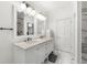 Elegant bathroom boasts double sinks, marble accents, and modern fixtures at 1079 Arbor Ne Trce, Atlanta, GA 30319