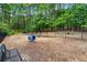 Community dog park with agility equipment, benches, and a fenced-in area for furry friends at 1079 Arbor Ne Trce, Atlanta, GA 30319