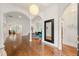 Elegant foyer boasting hardwood floors, arched doorways, and stylish decor creates a welcoming atmosphere at 1079 Arbor Ne Trce, Atlanta, GA 30319