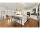 Bright and open kitchen with an eat-in island, stainless steel appliances, and lots of natural light at 1079 Arbor Ne Trce, Atlanta, GA 30319