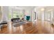 Bright living room with hardwood floors, arched windows, and an open layout, perfect for comfortable living at 1079 Arbor Ne Trce, Atlanta, GA 30319