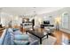 Cozy living room with hardwood floors, lots of natural light, an open floor plan, and modern furniture at 1079 Arbor Ne Trce, Atlanta, GA 30319