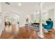 Spacious living room with hardwood floors, large windows, and an open layout, ideal for modern living at 1079 Arbor Ne Trce, Atlanta, GA 30319