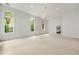 Expansive living room with large windows, offering natural light and a bright atmosphere at 1079 Arbor Ne Trce, Atlanta, GA 30319