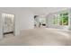 Spacious living room with large windows, leading to an en suite bathroom and exercise area at 1079 Arbor Ne Trce, Atlanta, GA 30319