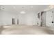 Spacious living room featuring neutral colors, staircase and ample space for personalization at 1079 Arbor Ne Trce, Atlanta, GA 30319