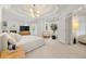 Spacious main bedroom with a tray ceiling, large windows, and balcony doors providing ample natural light at 1079 Arbor Ne Trce, Atlanta, GA 30319
