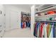 Spacious walk-in closet with ample hanging space and built-in shelving at 1079 Arbor Ne Trce, Atlanta, GA 30319