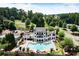 Aerial view of community pool, tennis courts, and beautifully landscaped grounds surrounding the property at 29 Laurelwood Nw Ln, Cartersville, GA 30121