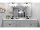 Bathroom featuring double vanity, modern lighting, and a glass shower at 29 Laurelwood Nw Ln, Cartersville, GA 30121