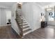 Open entryway showcasing the staircase, hardwood floors, and front door at 29 Laurelwood Nw Ln, Cartersville, GA 30121