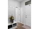 Inviting entryway features a hall tree with hooks and bench seating, complemented by hardwood floors at 29 Laurelwood Nw Ln, Cartersville, GA 30121