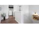 Hallway view leading to laundry room with modern washer and dryer at 29 Laurelwood Nw Ln, Cartersville, GA 30121